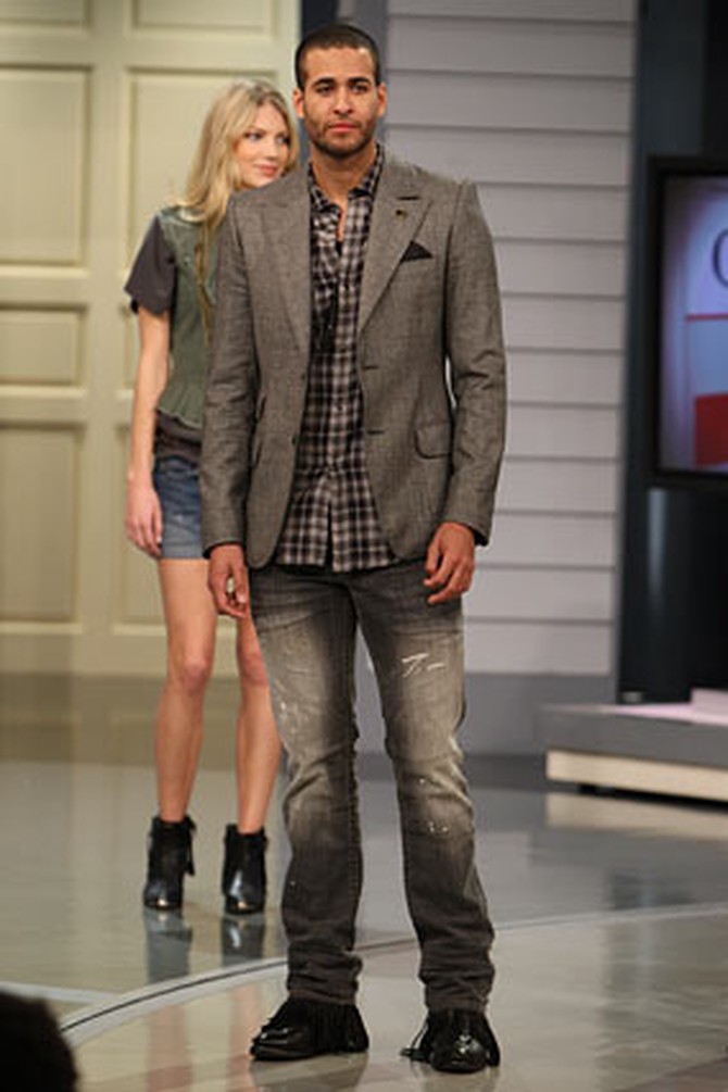 A male model pairs the William Rast Ben jeans with a flannel shirt and optical wave wool blazer.