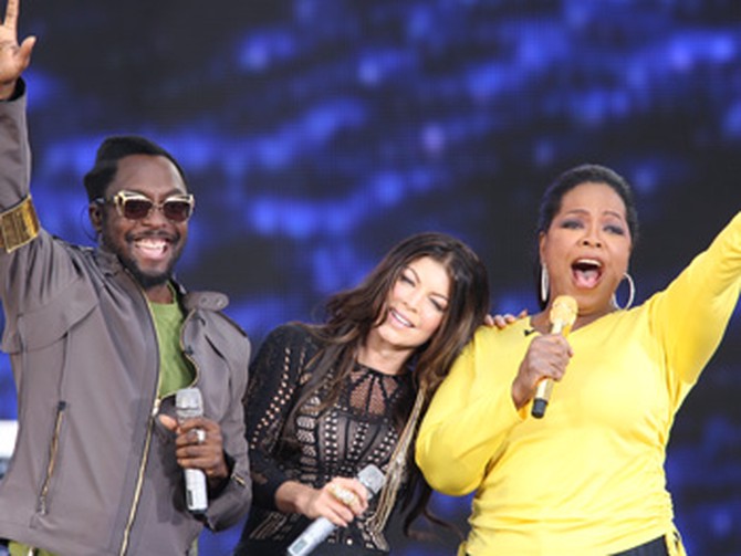 Fergie, will.i.am and Oprah celebrate in Chicago.
