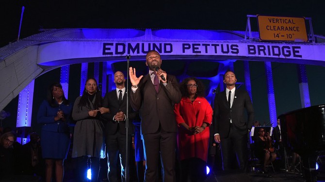 U.S. Rep. Terri Sewell, Ava DuVernay, Common, David Oyelowo, Oprah Winfrey and John Legend at Edmund Pettus Bridge