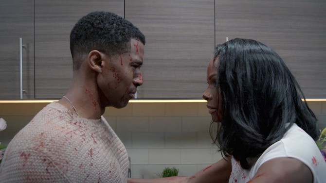 Gavin Houston and Tika Sumpter spattered with blood