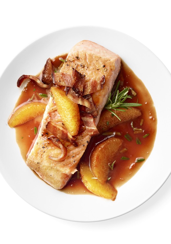 salmon with red wine sauce, bacon and orange slices