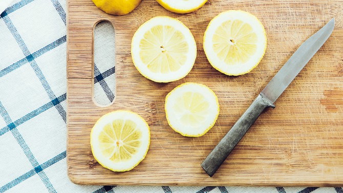 Sliced lemon on a cutting board