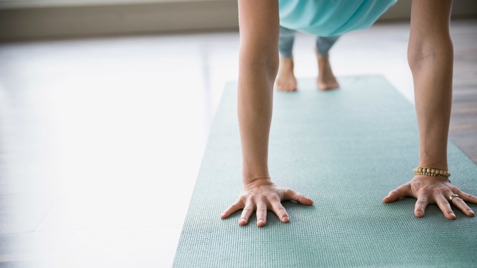 Woman holding the plank pose