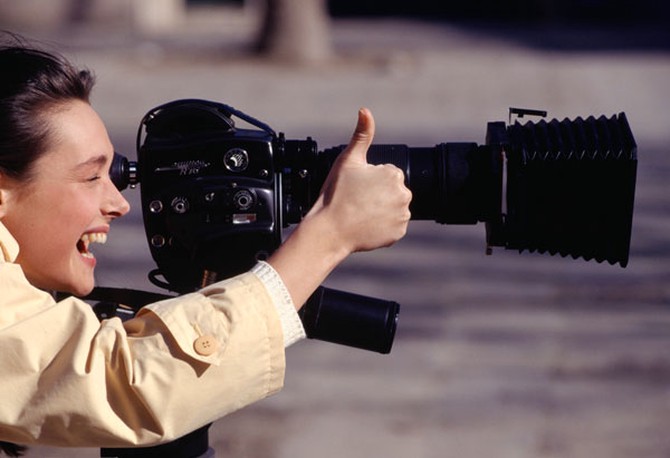 Woman shooting film