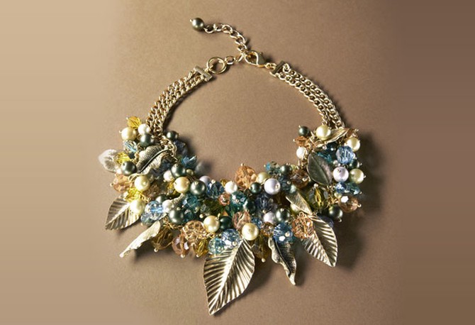 Necklace with bead and leaf detail