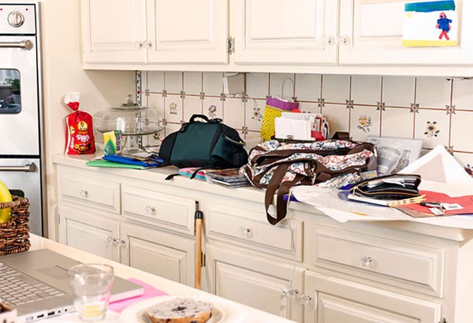 Messy, cluttered kitchen counter