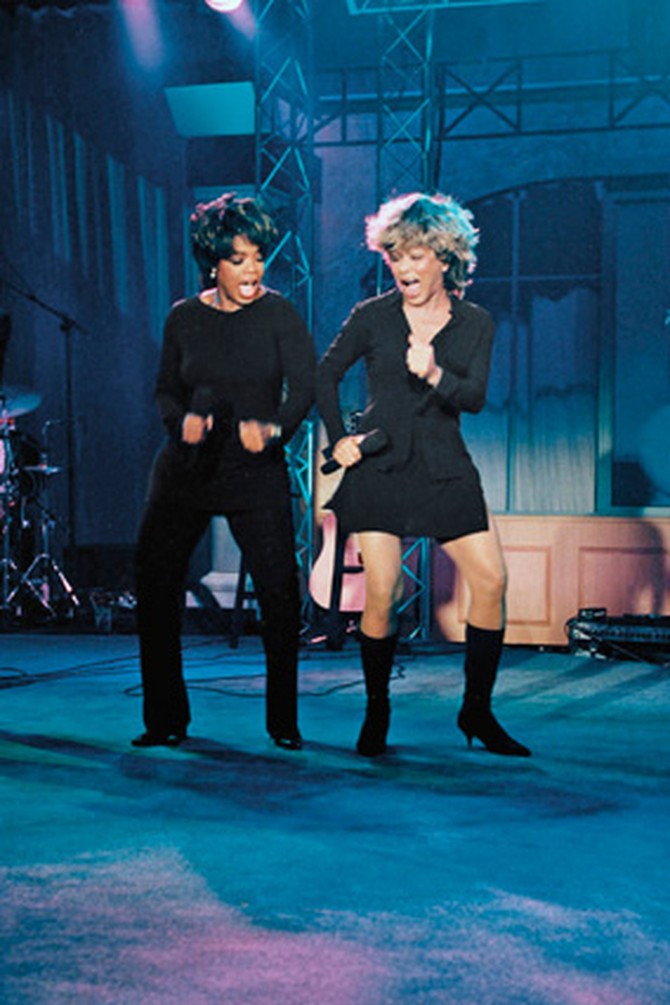 Oprah dancing with Tina Turner