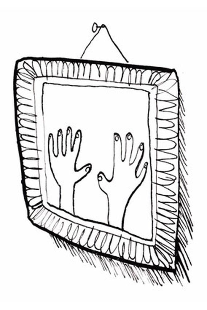 hands in picture frame
