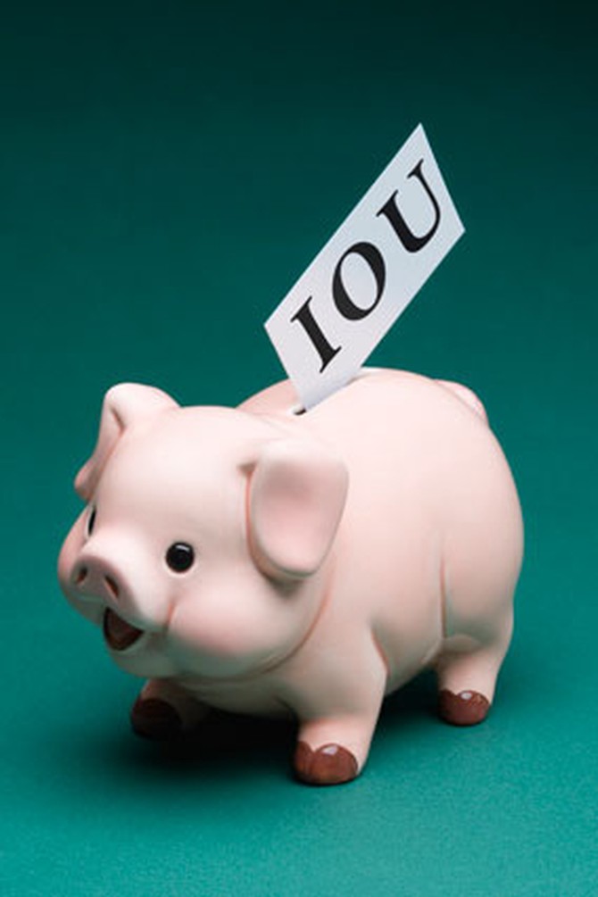 piggy bank with iou note