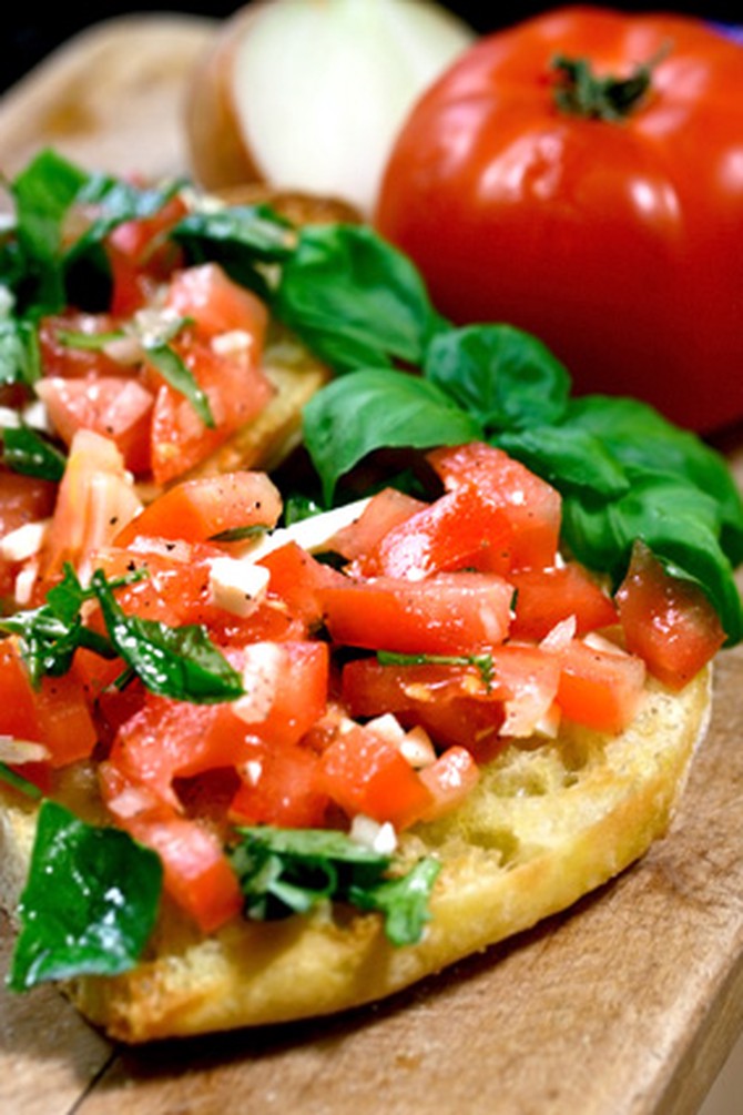 Bruschetta with chopped tomatoes, basil and cheese