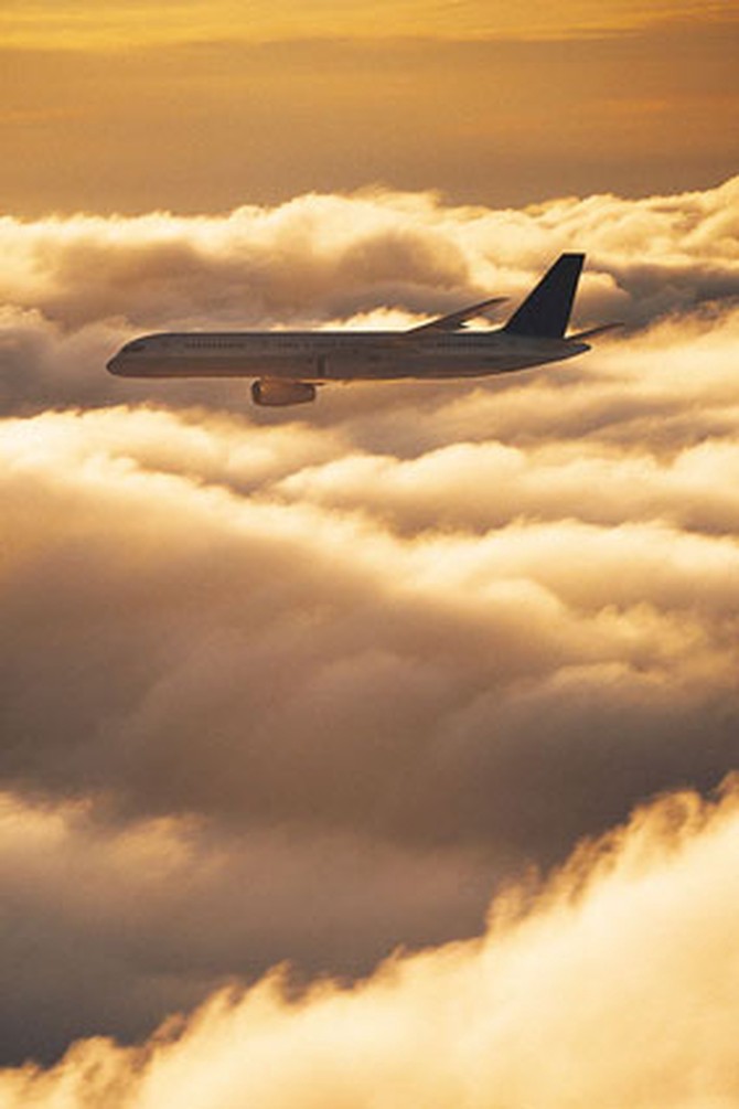 Airplane flying through clouds