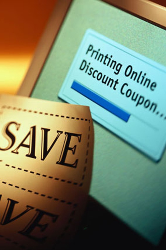 Online coupon being printed on computer