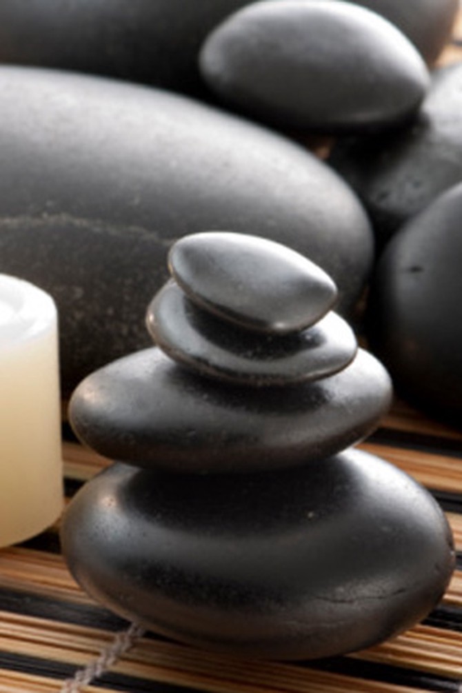 smooth stones and candle