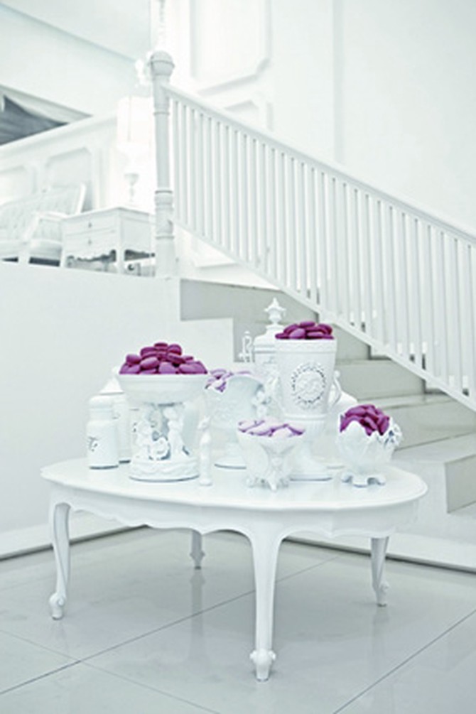 purple macarons in white vases