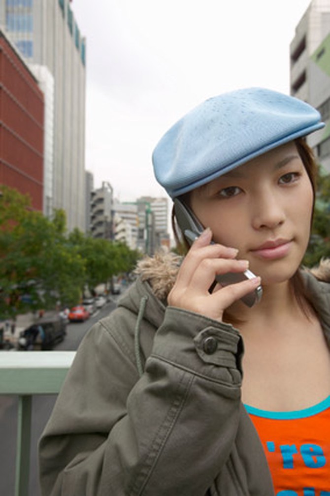 Woman listening to friend on mobile phone