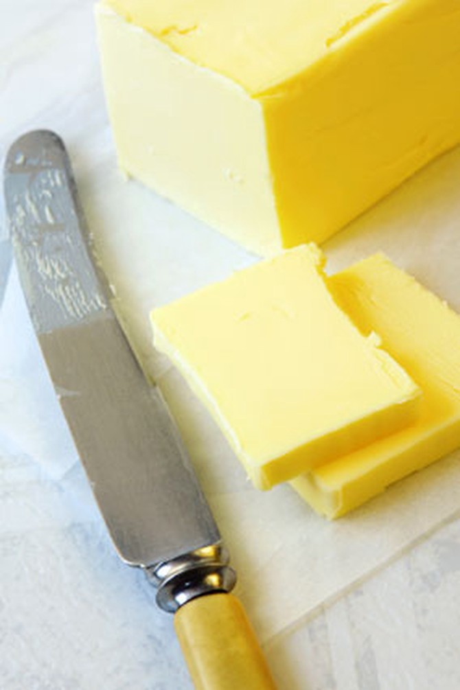 Stick of butter with butter knife