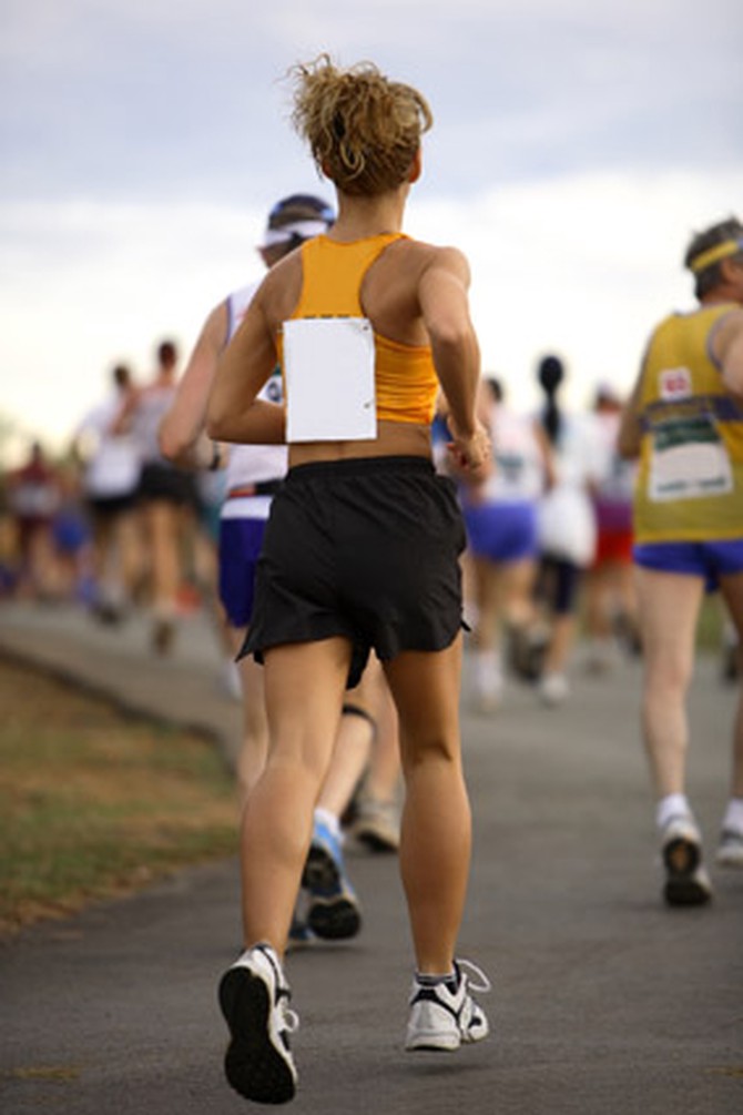 Woman running a marathon