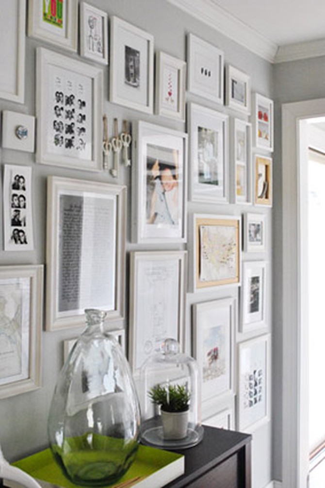 Framed photo collage in entryway