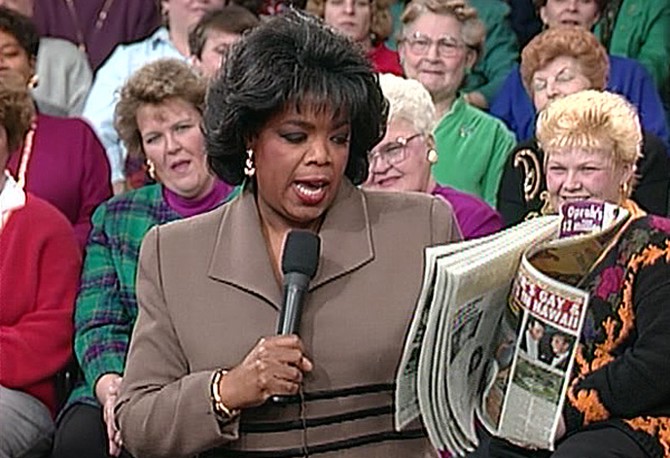 Oprah reads a tabloid story about herself