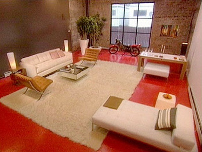 Sexy orange painted floors spices up a loft