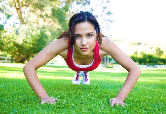 Woman doing push-up exercises