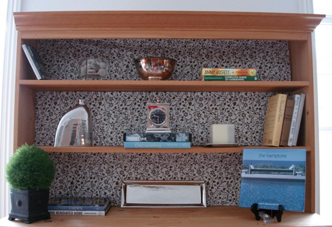 Shelves with wallpaper backing