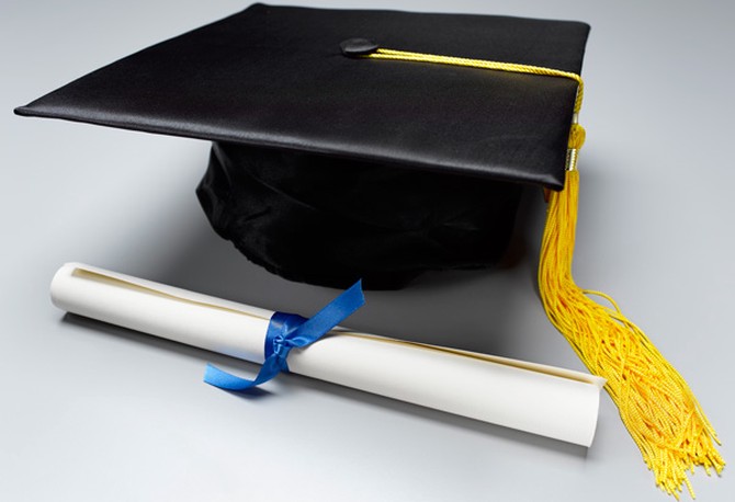 College graduation cap and diploma