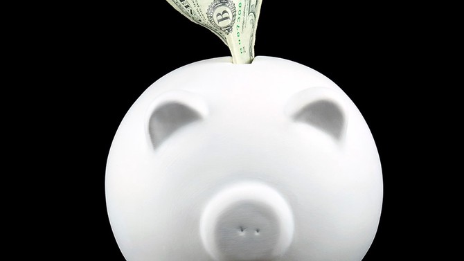 Money saving in a piggy bank