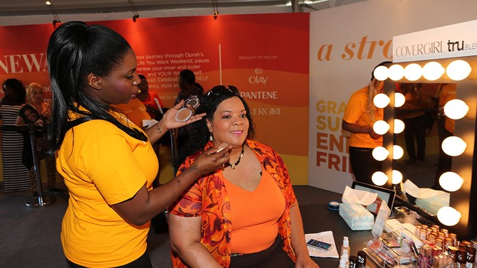 'Oprah's The Life You Want Weekend' attendee having makeup applied