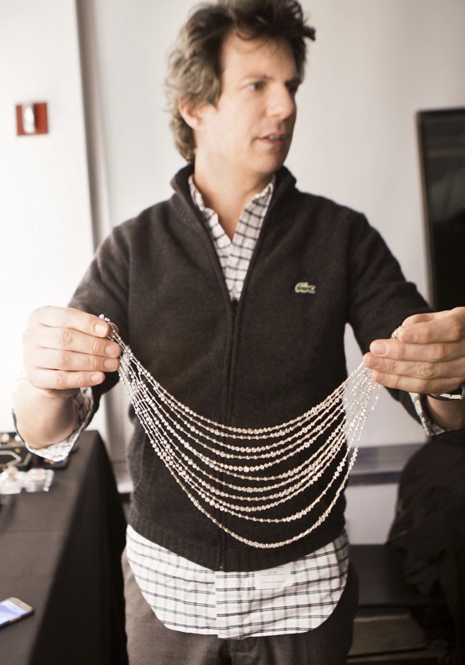 Adam glassman picks out a chain necklace