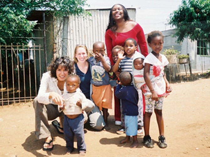 Marina, Carri and Tiffany with the children at the Jembizweni Daycare Center