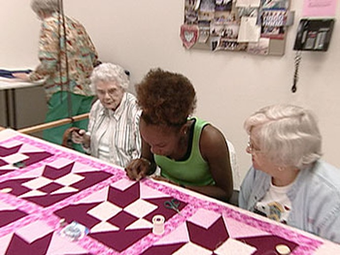 'Oprah's Big Give' contestant Rachael quilts at the Palmetto Senior Center.