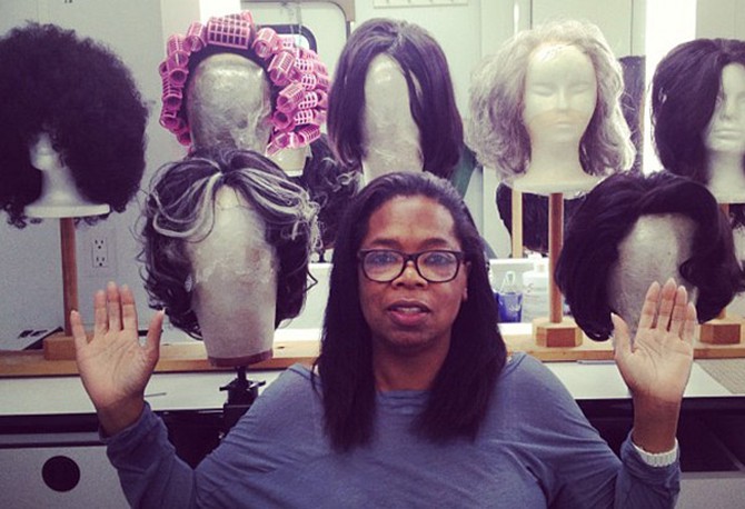 Oprah Winfrey with her wigs during filming of "Lee Daniels' The Butler"