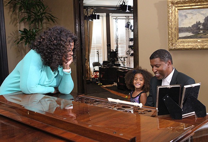 The Grammy award-winning R&B singer Kenny "Babyface" Edmonds entertains his daughter, Peyton, and Oprah with a rendition of "The Day (That You Gave Me a Son)"