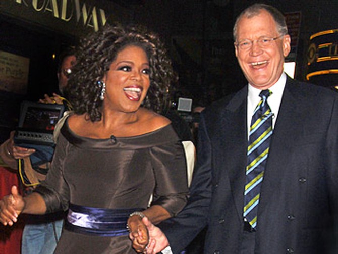 Oprah and David Letterman arrive on the red carpet