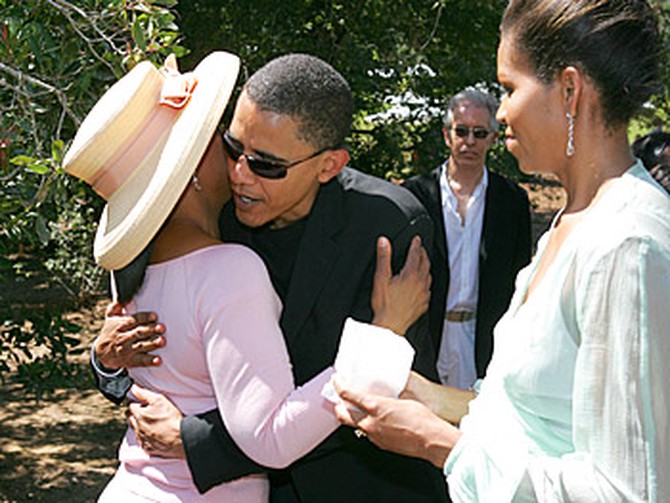 Oprah and Barack and Michelle Obama. Copyright 2005, Harpo Productions, Inc./George Burns & Bob Davis. All rights reserved.