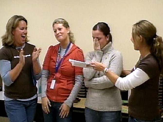 Kristin and Ally present their donation to two very surprised Project Kesho teachers.