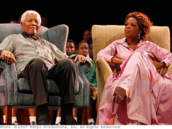 Oprah and Nelson Mandela on stage in South Africa