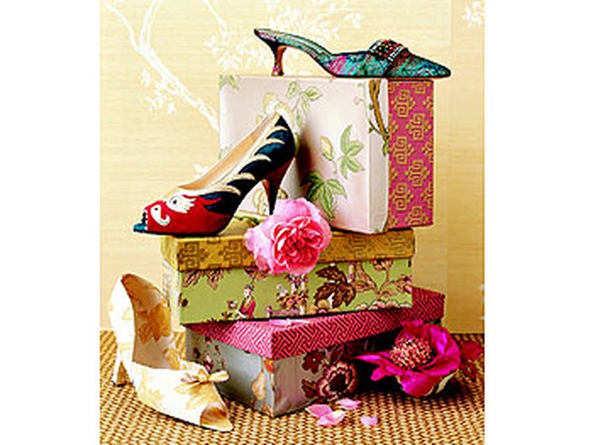 Shoe boxes covered in classic Chinese motifs.