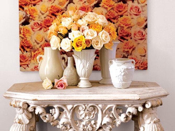 A photo collage of roses hangs in the foyer.