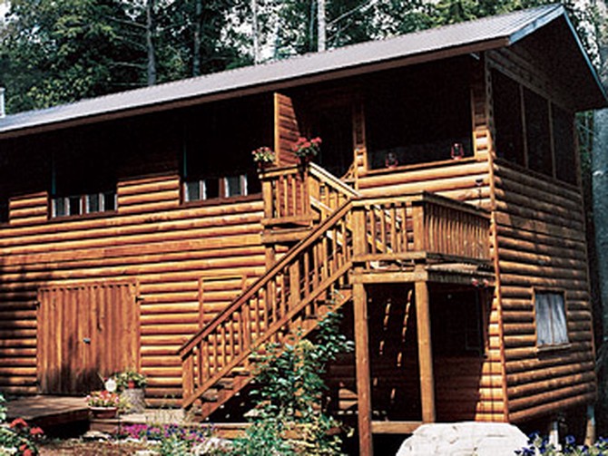 The log cabin was built with untreated lumber.