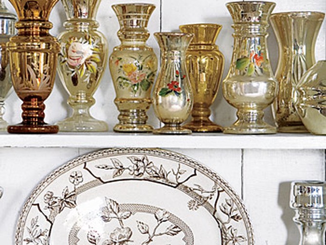 Early-20th-century mercury glass and 19th-century brown-and-white transferware.