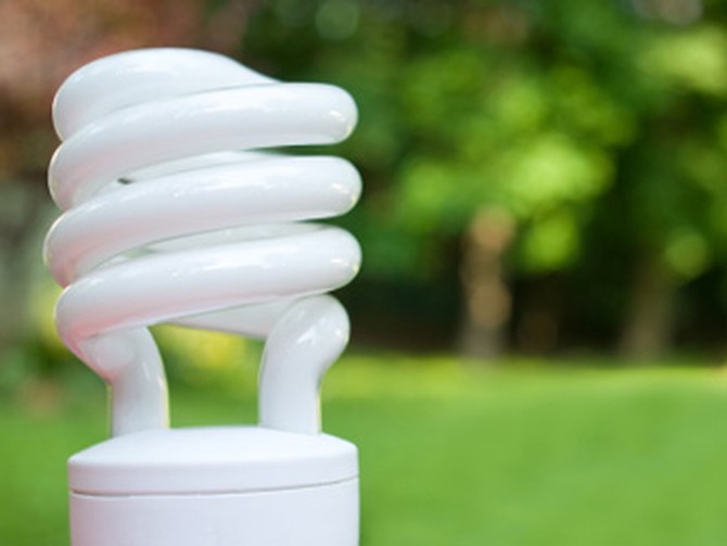 Swap old bulbs with compact florescent lightbulbs.