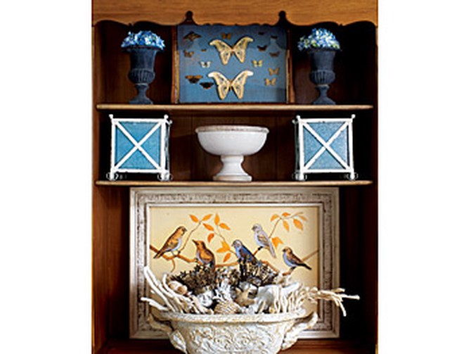 A shelf displays Kirsten's design ideas.