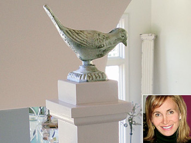 Kristin used iron birds to dress up her stairway newels.