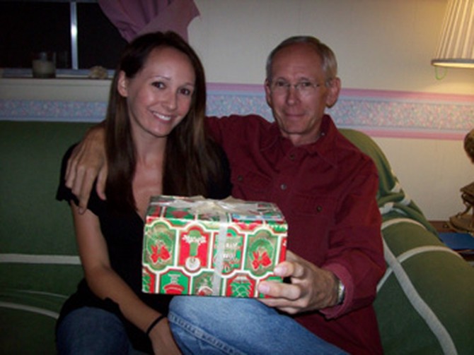 Clarissa and her father with unopened present