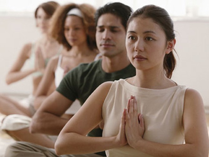People practicing meditation