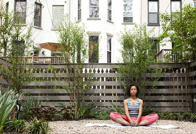 Woman meditating outside