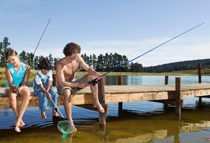Dad and kids fishing