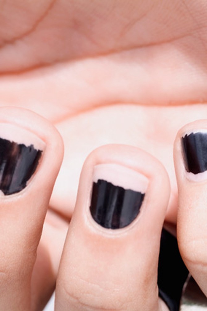 Dark, chipped nail polish